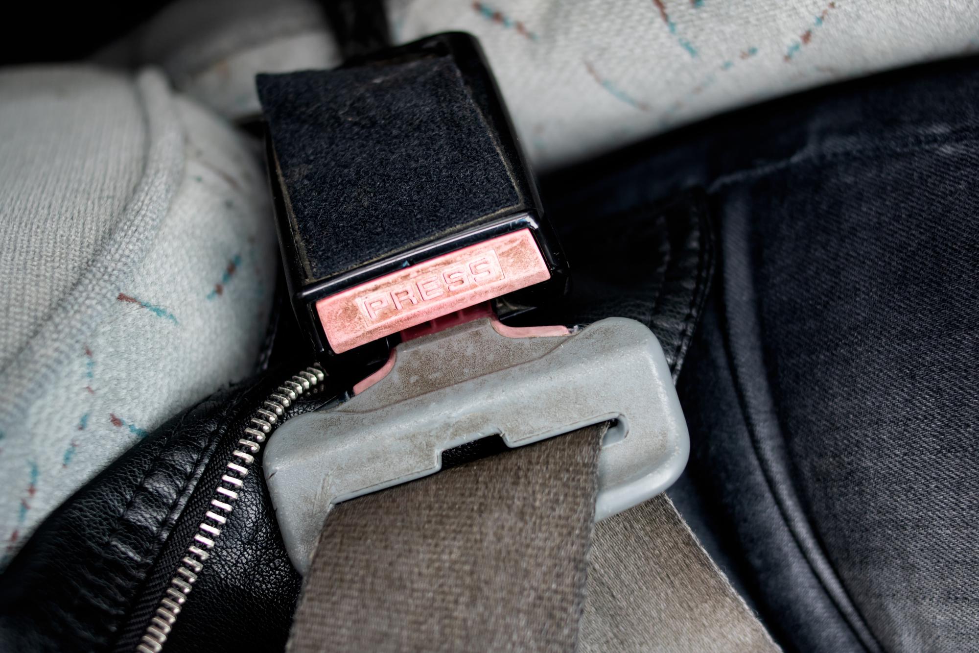 Vehicle seatbelt in a car interior — Roseville defective seatbelt attorneys
